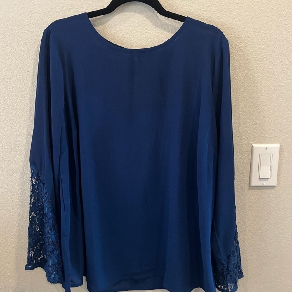 Long sleeve flowy top with embellished sleeves